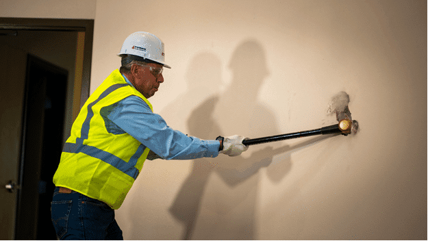 Pictured: Mayor Steve D’Amico takes the first swing